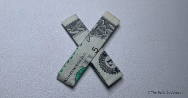 dollar bill origami letter x complete